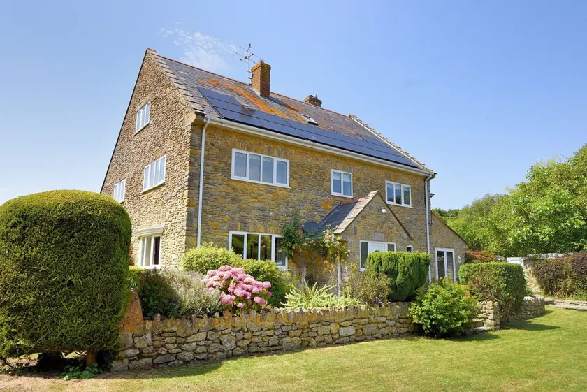 MANOR LODGE, family friendly, with open fire in Burton Bradstock - Image 1