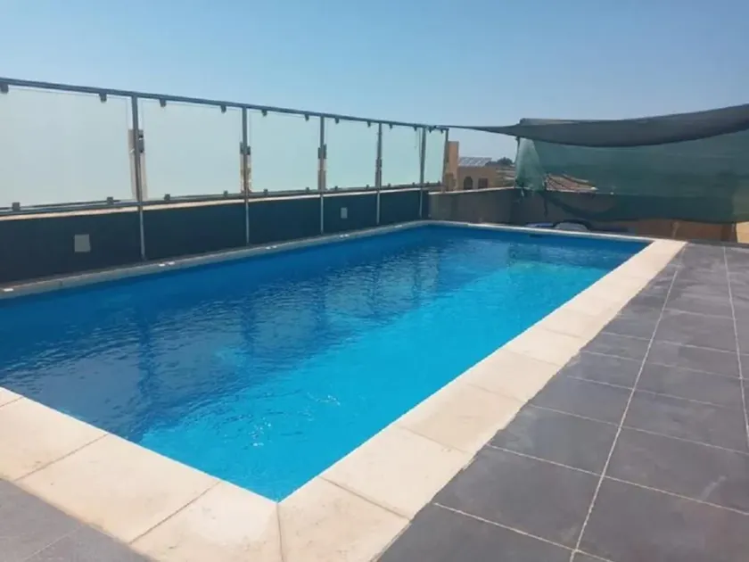 Shared cauchi corner house with roof top pool and pay per use aircondition - Image 1