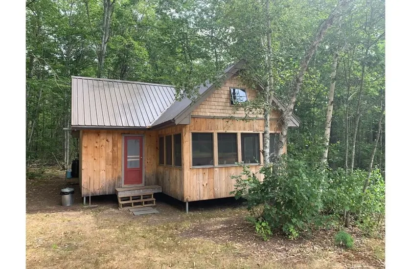 An off-grid comfy cabin in a quiet corner of a midcoast organic farm - Image 1
