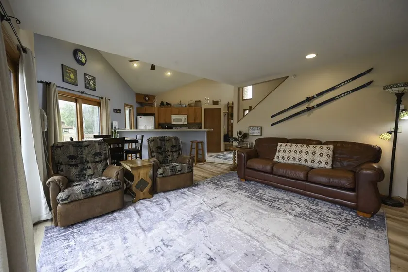 Deck with views! 2 bed 2 bath sleeps 6-8, pool,close to Torch Lake, Boat parking - Image 1