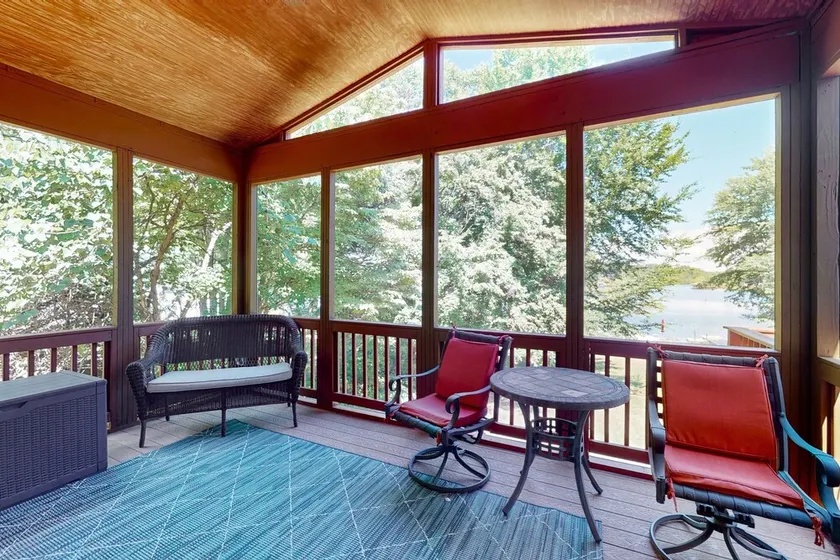 Lakefront retreat with private dock, kayaks, volleyball, firepit, Ping-Pong - Image 1