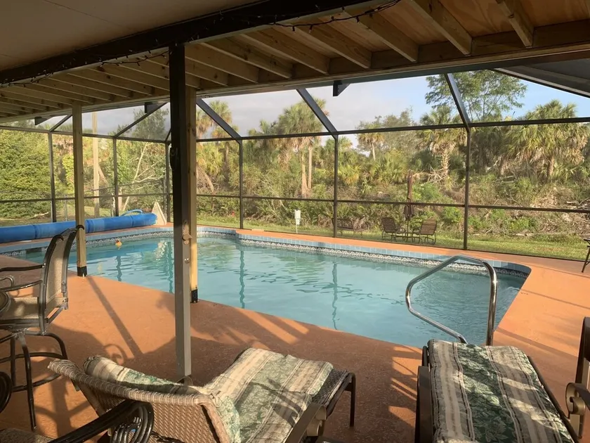 Waterfront single home rental with private lanai, heated pool, and hot tub! - Image 1