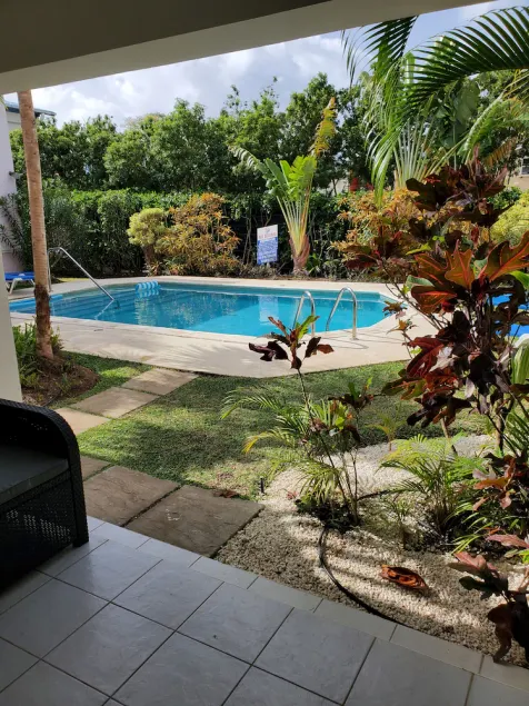 2 mins to beach! Family sized condo with a pool. Super close to dining and fun! - Image 1