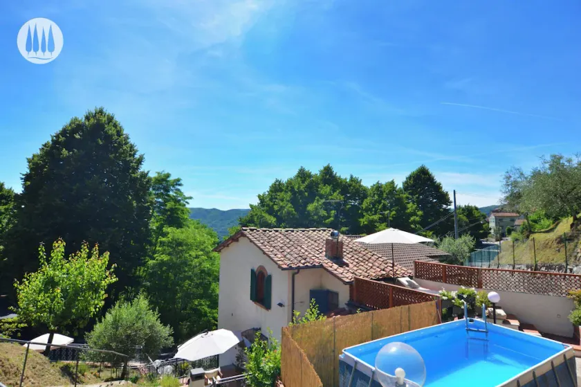Vacation home with hillside view and pool - Image 1