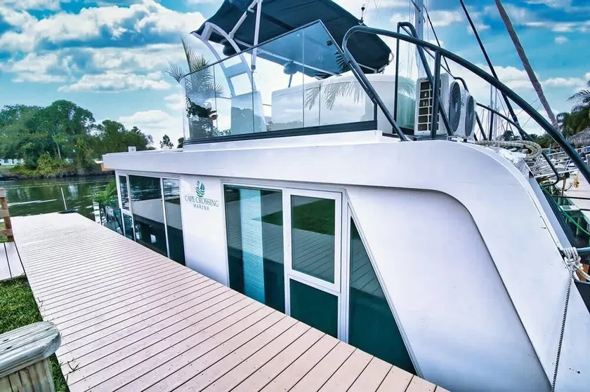 Shangri La: Waterfront Boat Bungalow with Resort Access! - Image 1