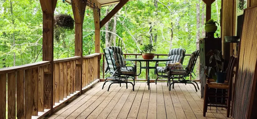 Watch the birds on a wrap-around porch. Very private and pet friendly. - Image 1
