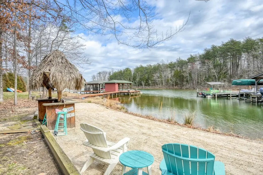 Lakefront home with private hot tub, dock, grill, game room, lake views & kayaks - Image 1