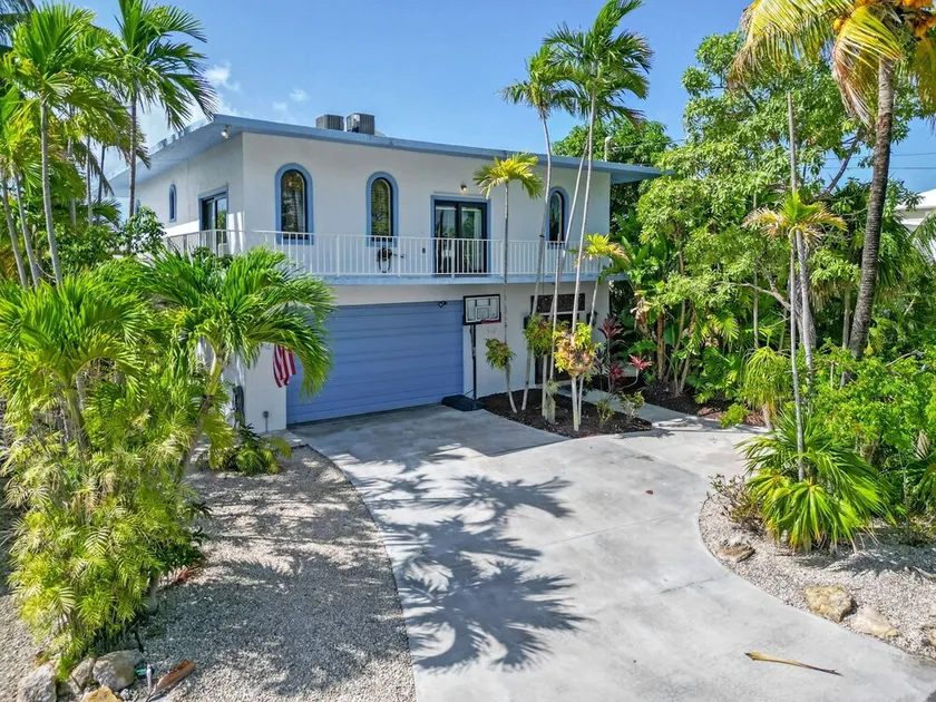 Island pool home awaits in Islamorada's Port Antigua - Image 1