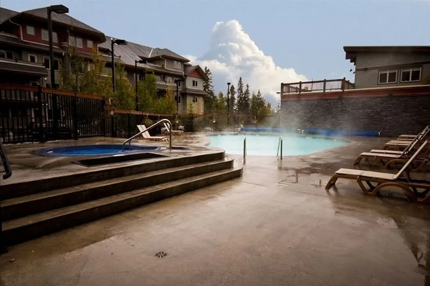 Heated Pool, 3 Hot Tubs, BBQ, 2 bdrm condo - 5 min from Banff National Park - Image 1