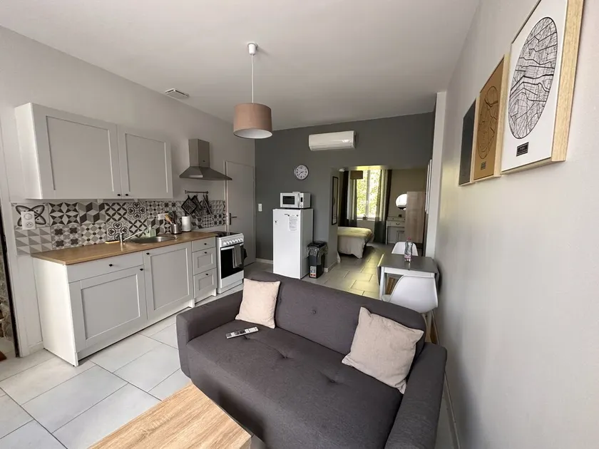 A modern and comfortably furnished apartment in Contrexéville, set in a green environment - Image 1