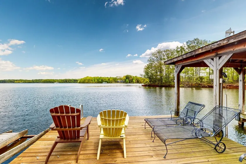 Lakefront home with two kitchens, a dock, firepit, & pontoon - Image 1