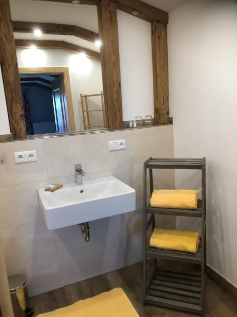 Vacation apartment with a view of the beer garden, shower, toilet, and balcony - Image 1