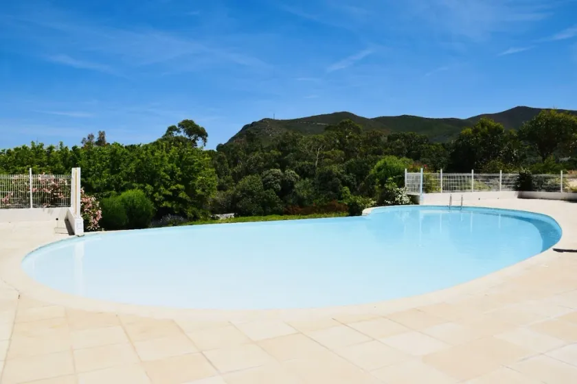 Charming residence with waterfront pool. - Image 1