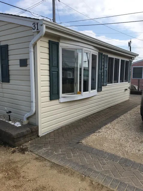 Beautiful Cozy Beach Cottage in Ocean Beach III - 8 houses from the beach! - Image 1