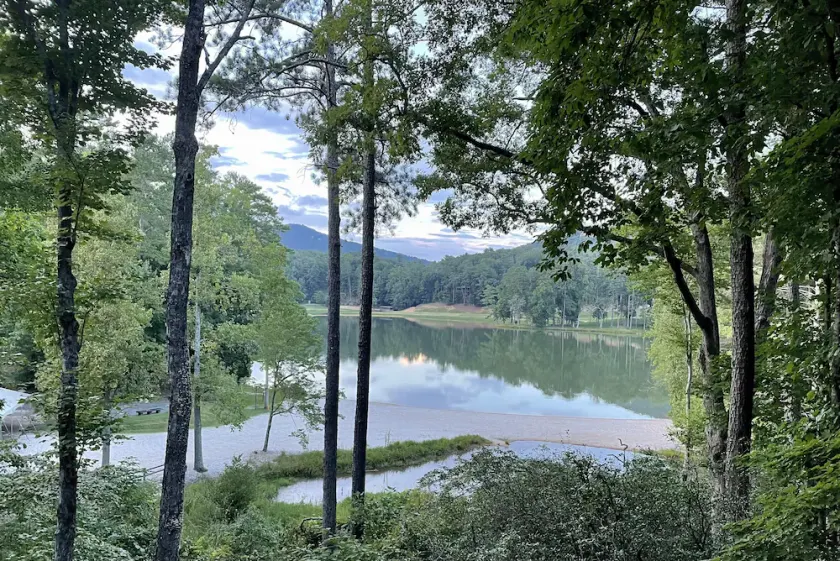 Breathtaking lake views, steps from beach, golf, and clubhouse. Renovated home! - Image 1