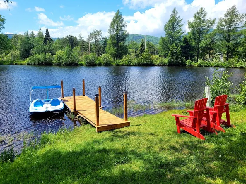 Chalet en Rondins de Bois Avec lac Privé - Image 1