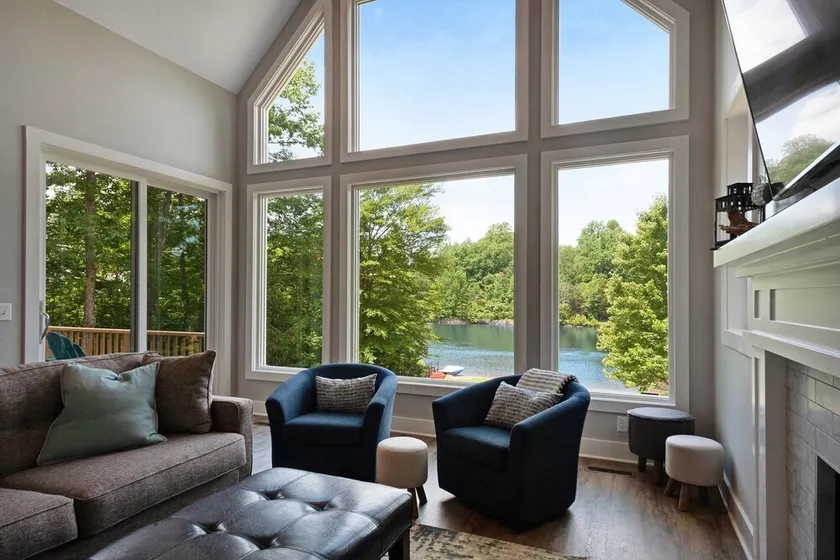 Custom lakefront home with private beach, dock & firepitq - Image 1
