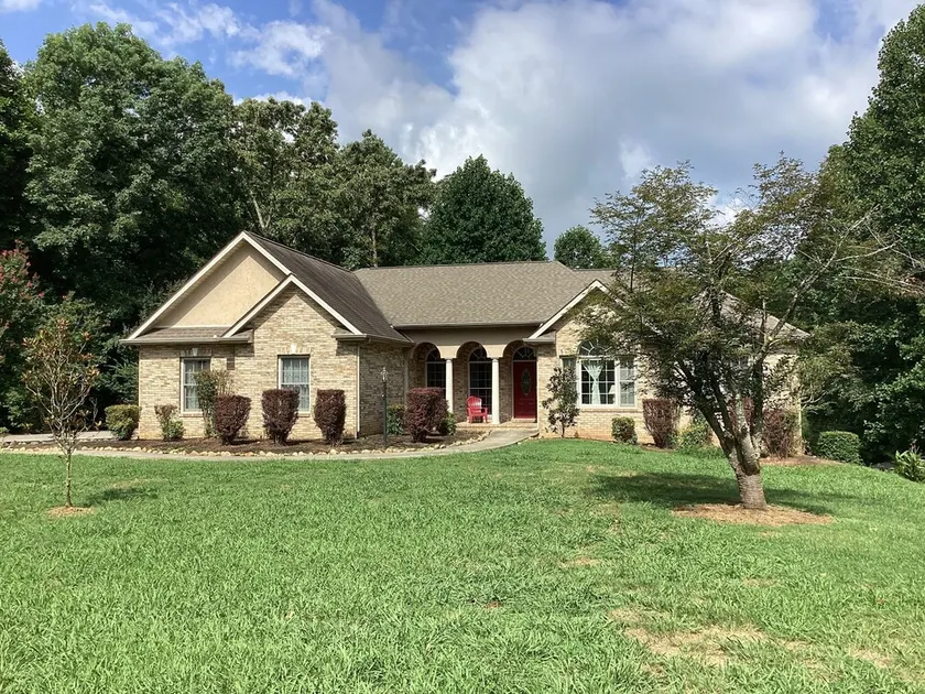Home on secluded 5 acres with private dock on TN river 100 yards from house. - Image 1