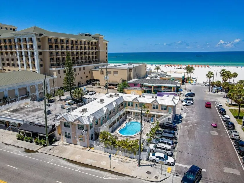 Steps to the beach! Ground floor 1BR + heated pool - Image 1