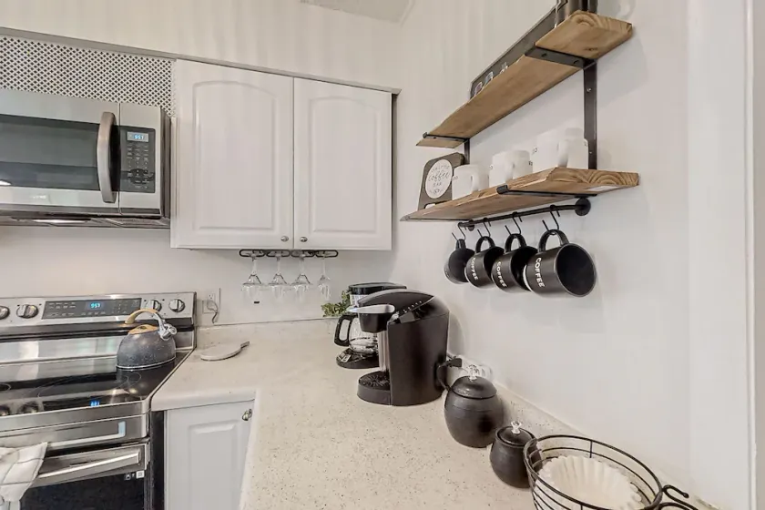 Dog-friendly home with fenced yard, patio, grill, & park across the street - Image 1