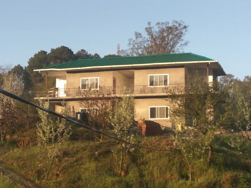 It  is surrounded by lush green mountains, with fruit garden & vegetable fields. - Image 1