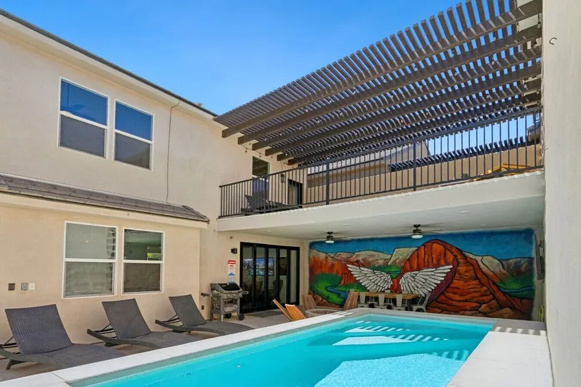 It has a private pool, bunk room, arcade & fire pit! - Image 1