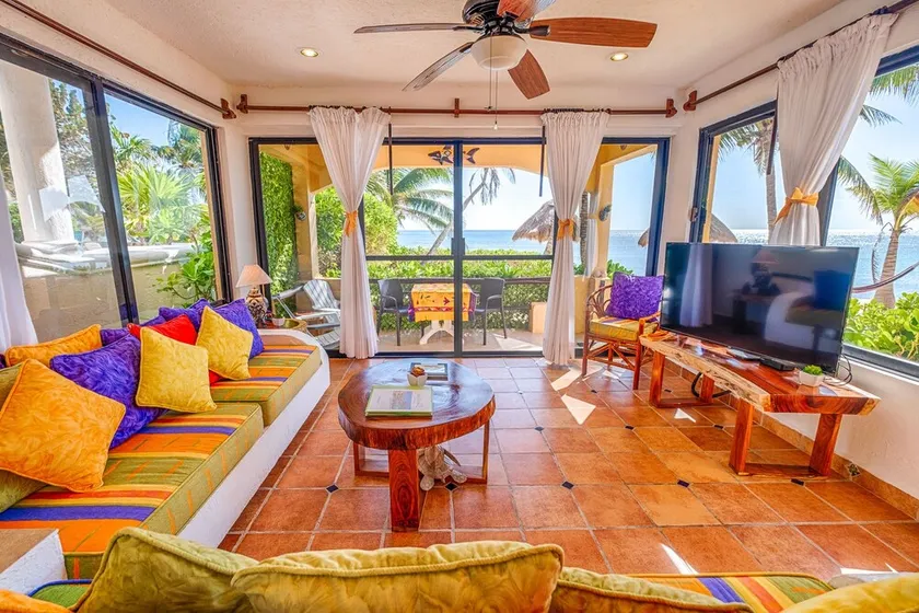 Walk onto the white sandy beach of Half Moon Bay from your patio door! - Image 1