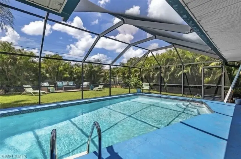 Sunshine Awaits, Tropical 3br home w heated pool, short drive to beach.  Pets - Image 1