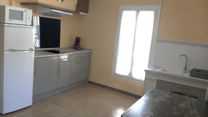 T2 dans maison de village - Image 1