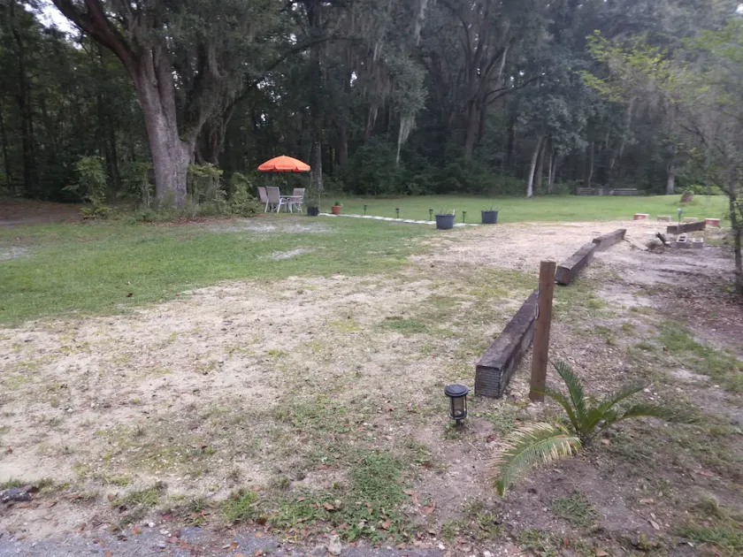 Full hook up RV Trailer site on private 1 acre Conveniently located - Image 1