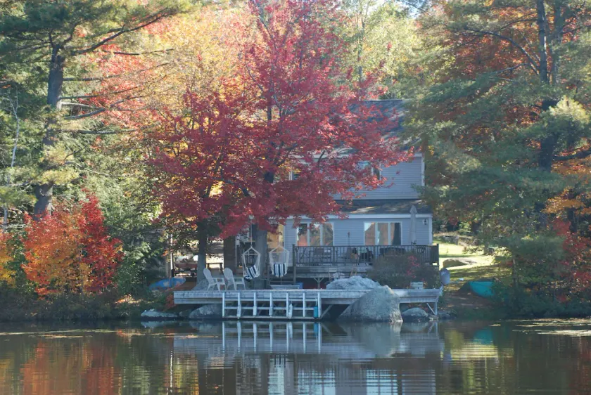 Waterfront home with magnificent sunsets on tranquil lake - Image 1