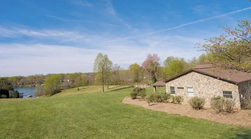 Private 11-Acre Lakefront Escape w/ 2 Cottages, Dock & Games - Image 1