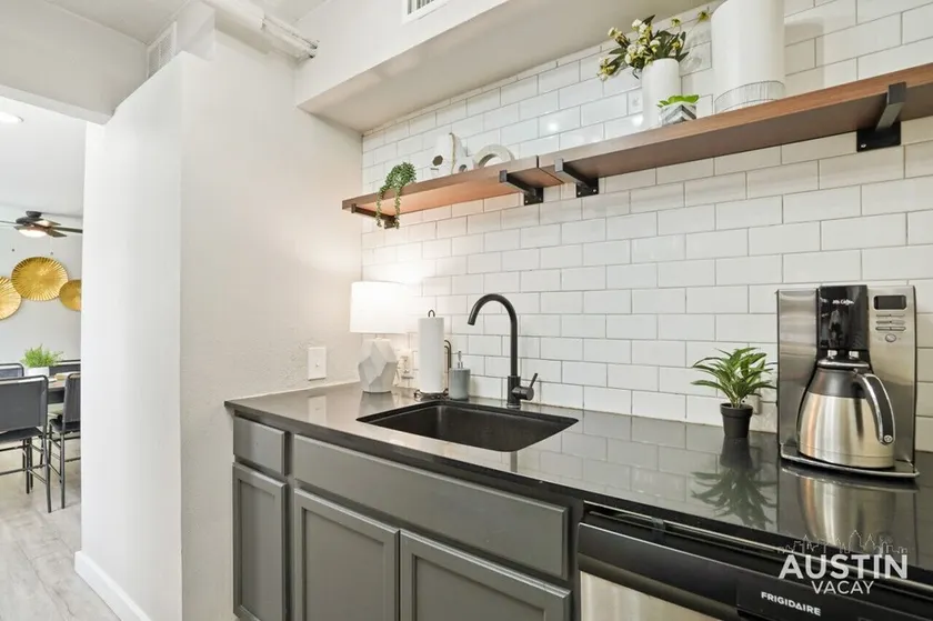 Walk to Restaurants or Cook in Subway Tile Kitchen - Image 1