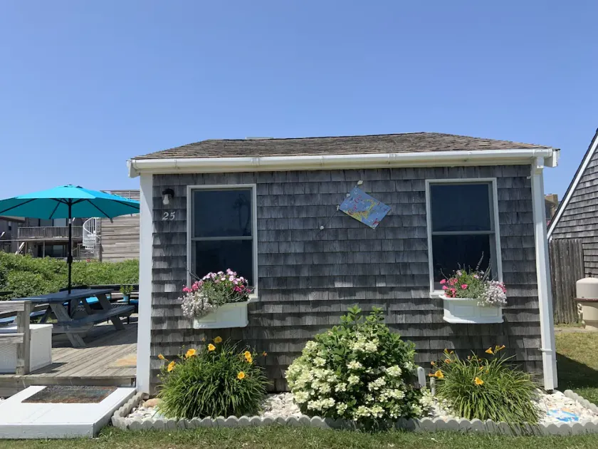 Provincetown cottage: outdoor shower,parking,two decks, pool, steps to beach. - Image 1