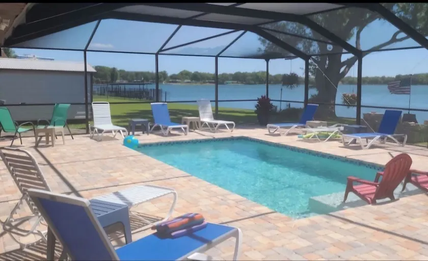 Family Home on Bellows Lake, with new pool.  6505 Walton Way - Image 1