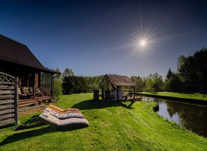 Holiday home with private pond, jacuzzi and sauna - Image 1