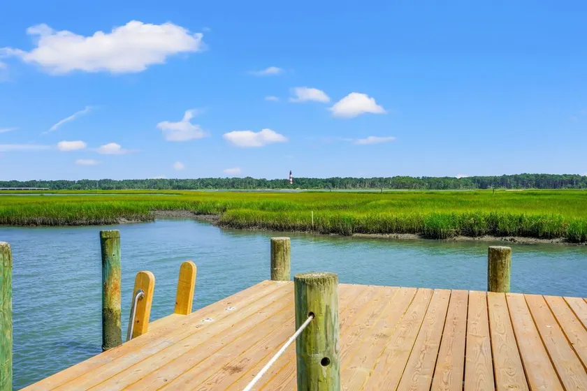 Lighthouse View | East Side Townhome, Pool, Dock Access + Pet Friendly - Image 1