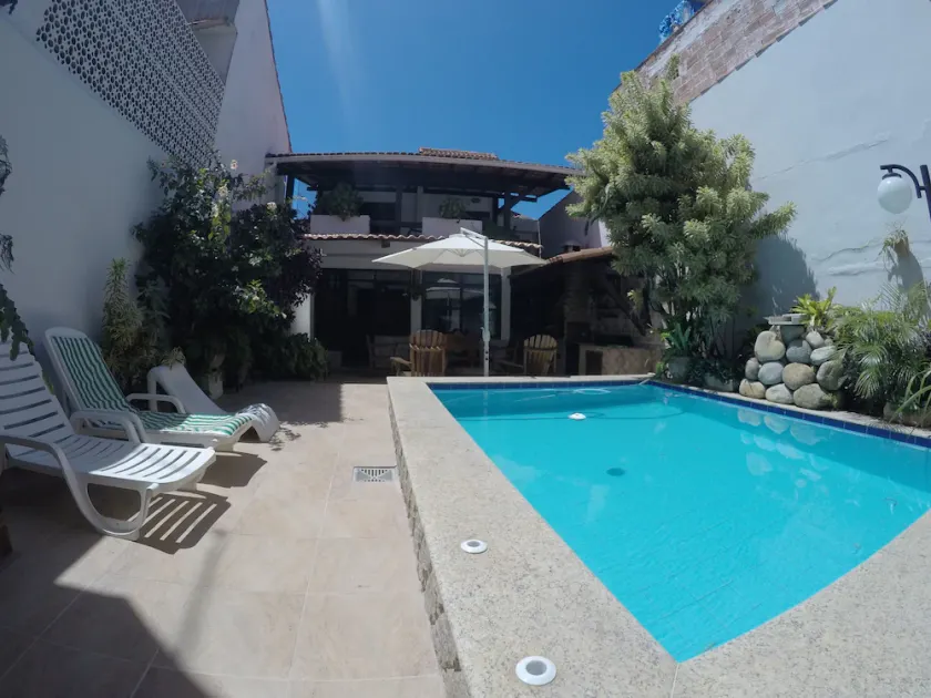 Beautiful rustic house with a 4x3 pool and 7 bedrooms in Arraial - five of which are suites. - Image 1