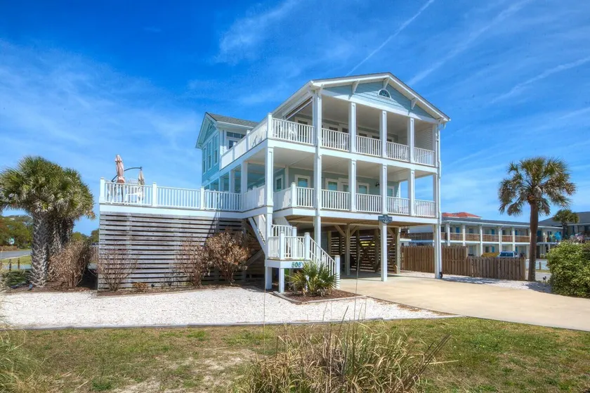 Discover beachfront bliss at Starboard Side, Oak Island's spacious 4-bedroom retreat. - Image 1