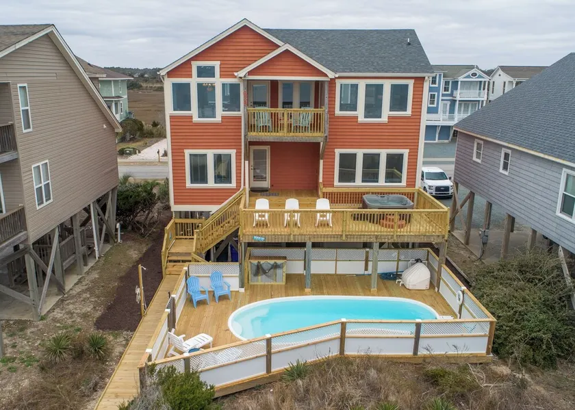 Hobbs Realty - Enjoy sunny \"Beach Daze\" in your private pool and hot tub in this oceanfront home. - Image 1