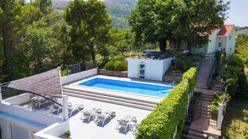 Beachfront Villa Erce with private 40sqm heated pool, a Gym, 7 en-suite bedrooms, a rooftop terrace, 2 living areas - Image 1