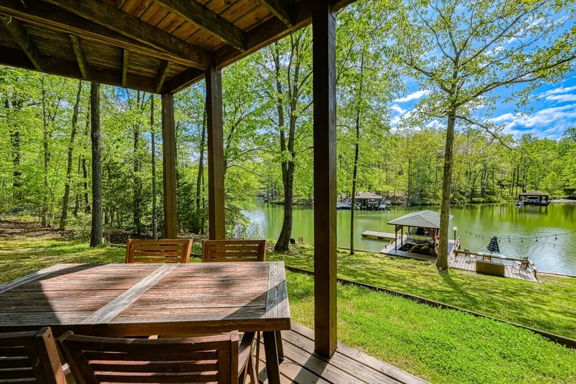 Serene lakefront home with free WiFi, private dock, game room, & central AC - Image 1
