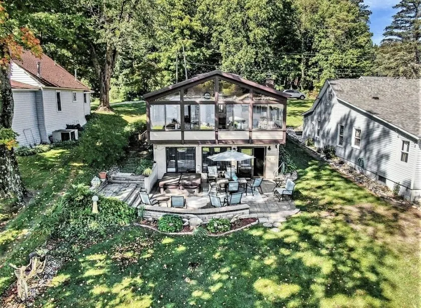 Updated and fully appointed Round Lake waterfront home w/ hot tub! - Image 1