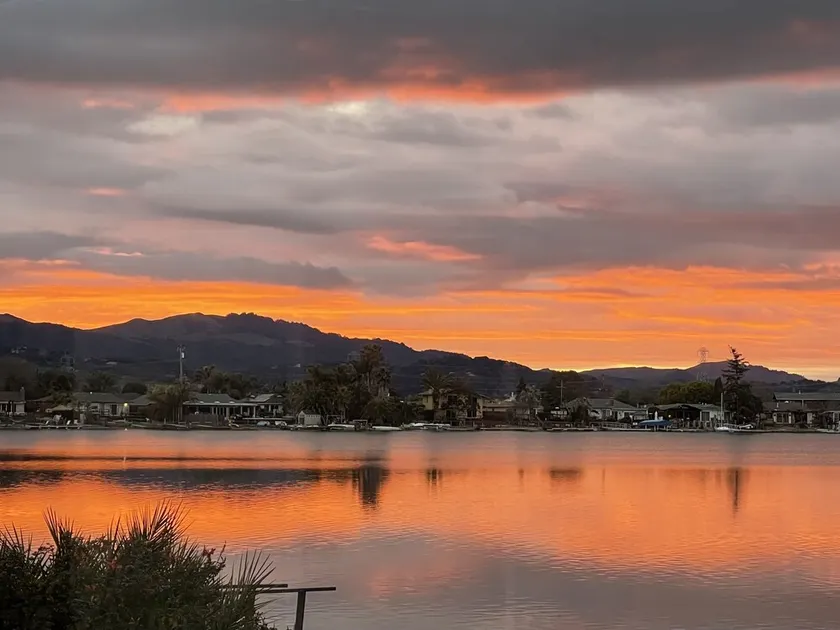 WATCH THE SETTING SUN &<br>THE MARIN MOUNTAINS OR KAYAK THE <br>LAGOON from the dock - Image 1
