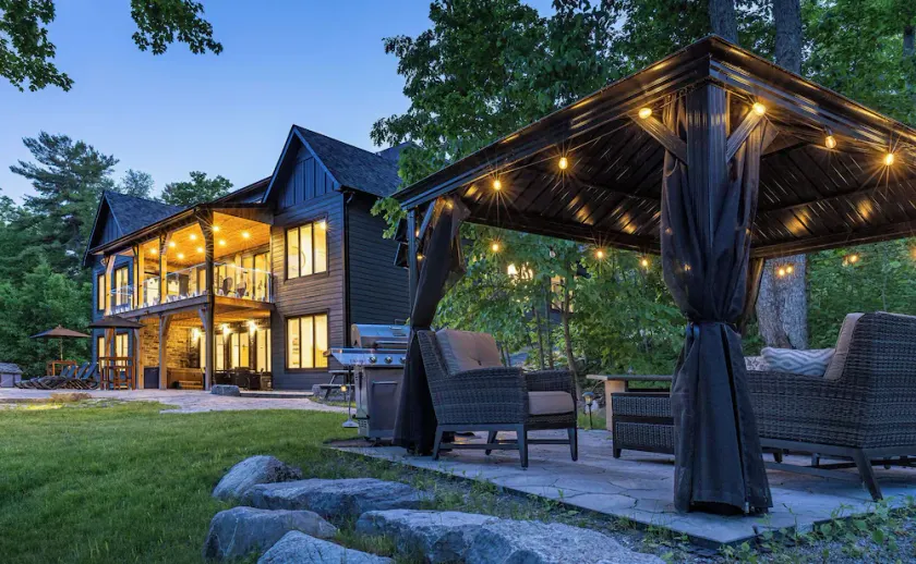 Buckhorn Blue-Waterfront Luxury Cottage-5 bdrm-HotTub,Sauna,Rec Room, Beach Area - Image 1