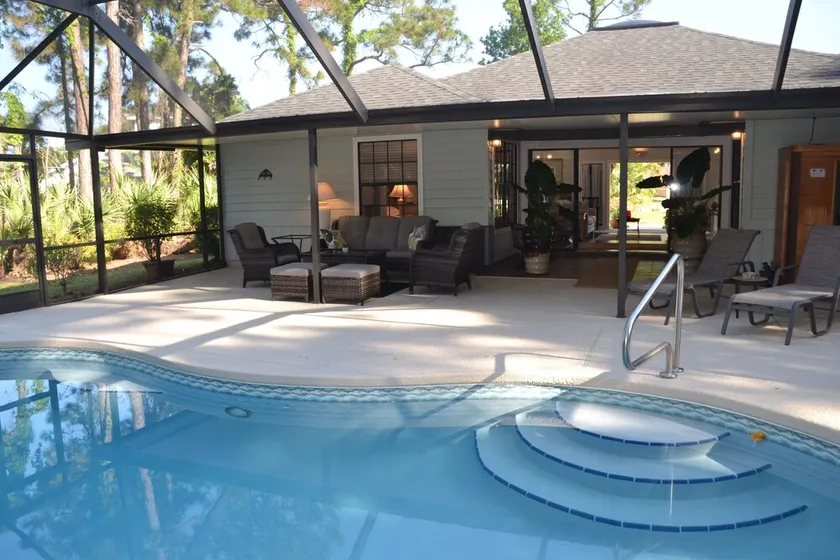 Tropical Paradise! Heated Pool & Sauna. Large very private yard. Near Everything - Image 1