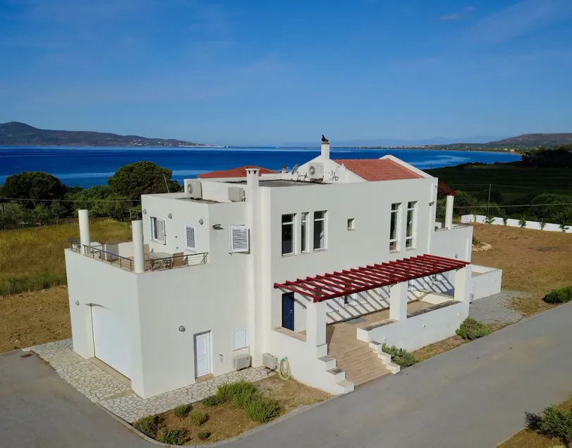 Neapoli Beach Retreat - 4 bed, 4.5 bath Custom Home! Steps to the Sandy Beach! - Image 1