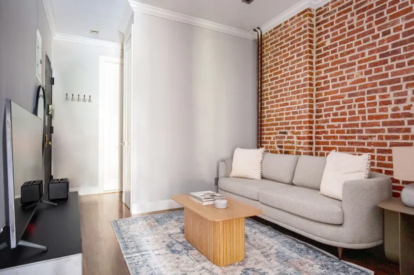 Hip Midtown West 2BR w/ W/D & Wine Fridge, nr 1 Train, by Blueground - Image 1