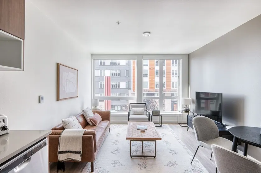 Chic First Hill 1BR w/ Gym, BBQ & Lounge, nr soccer field, by Blueground - Image 1