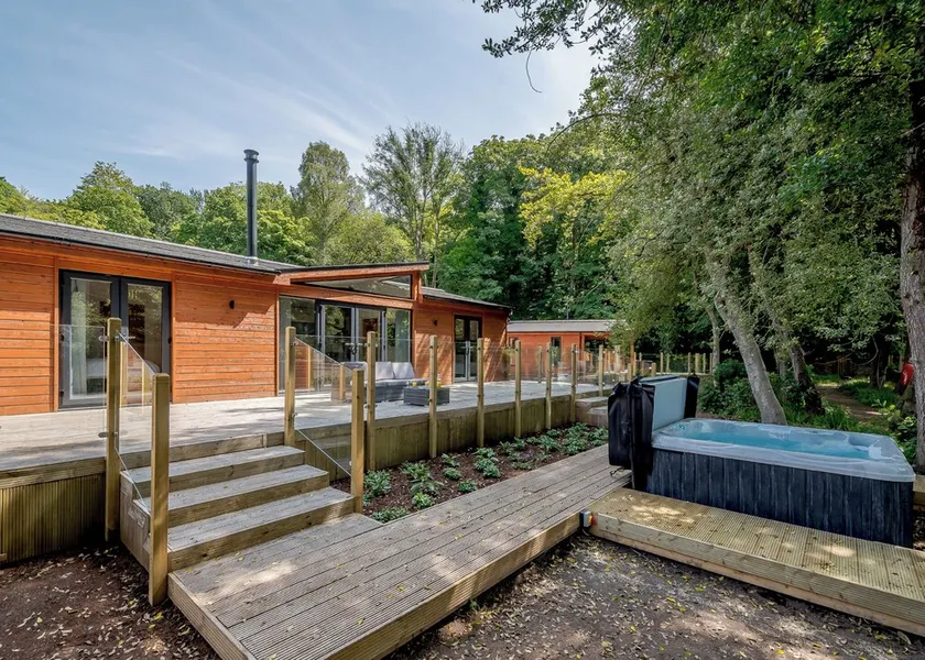 A stunning lodge with a centre lounge. - Image 1